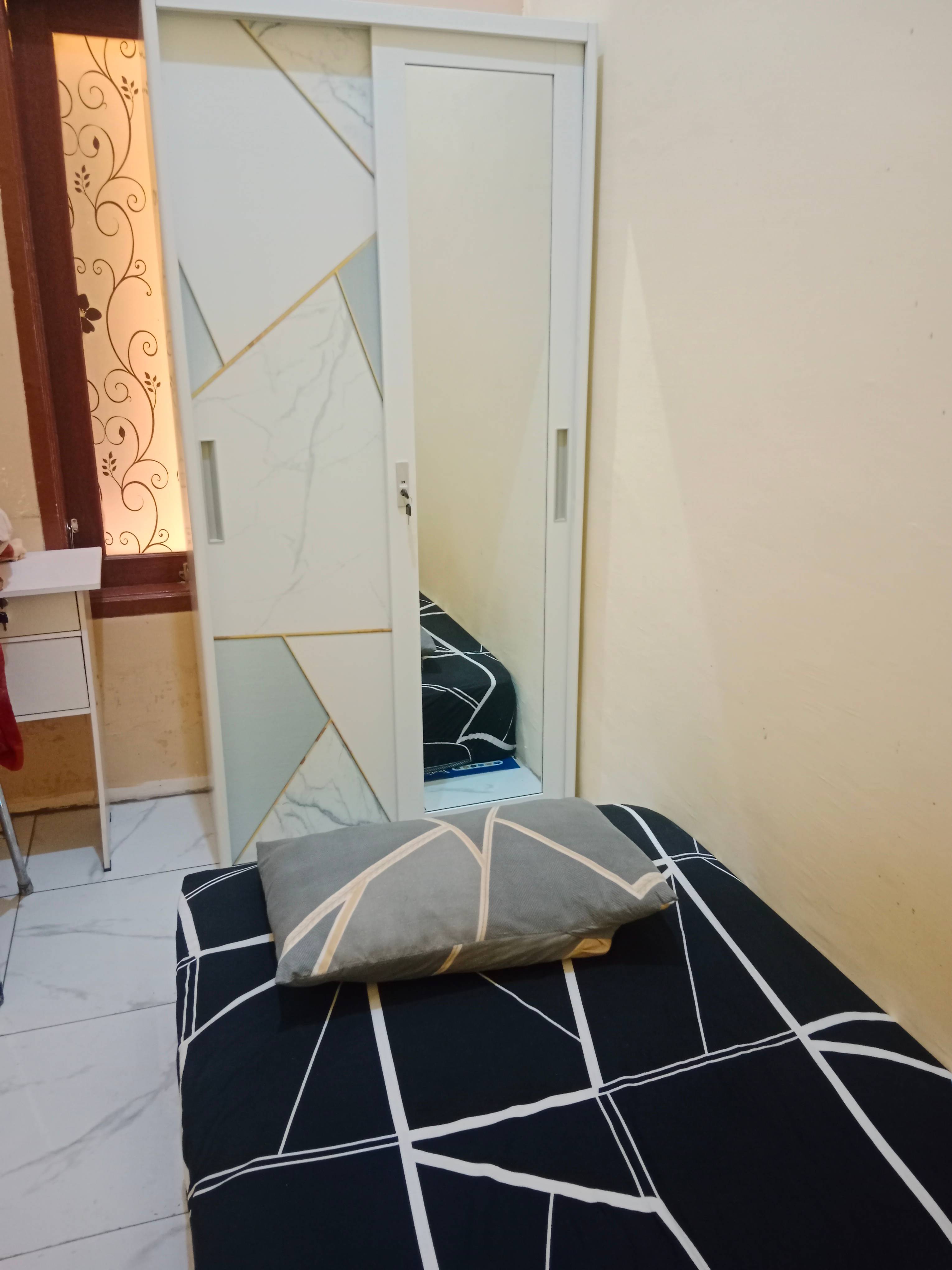 kamar 1