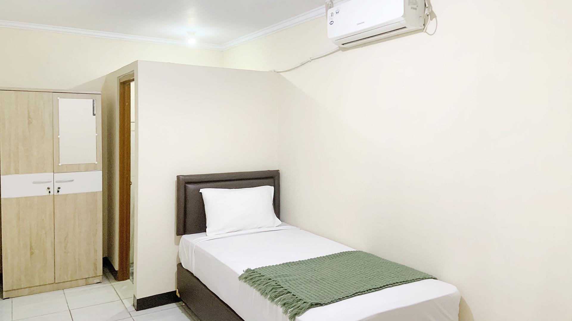 https://images.rukita.co/buildings/building/011084a1-bf85-4bad-b4b4-60c02393a91f.jpg