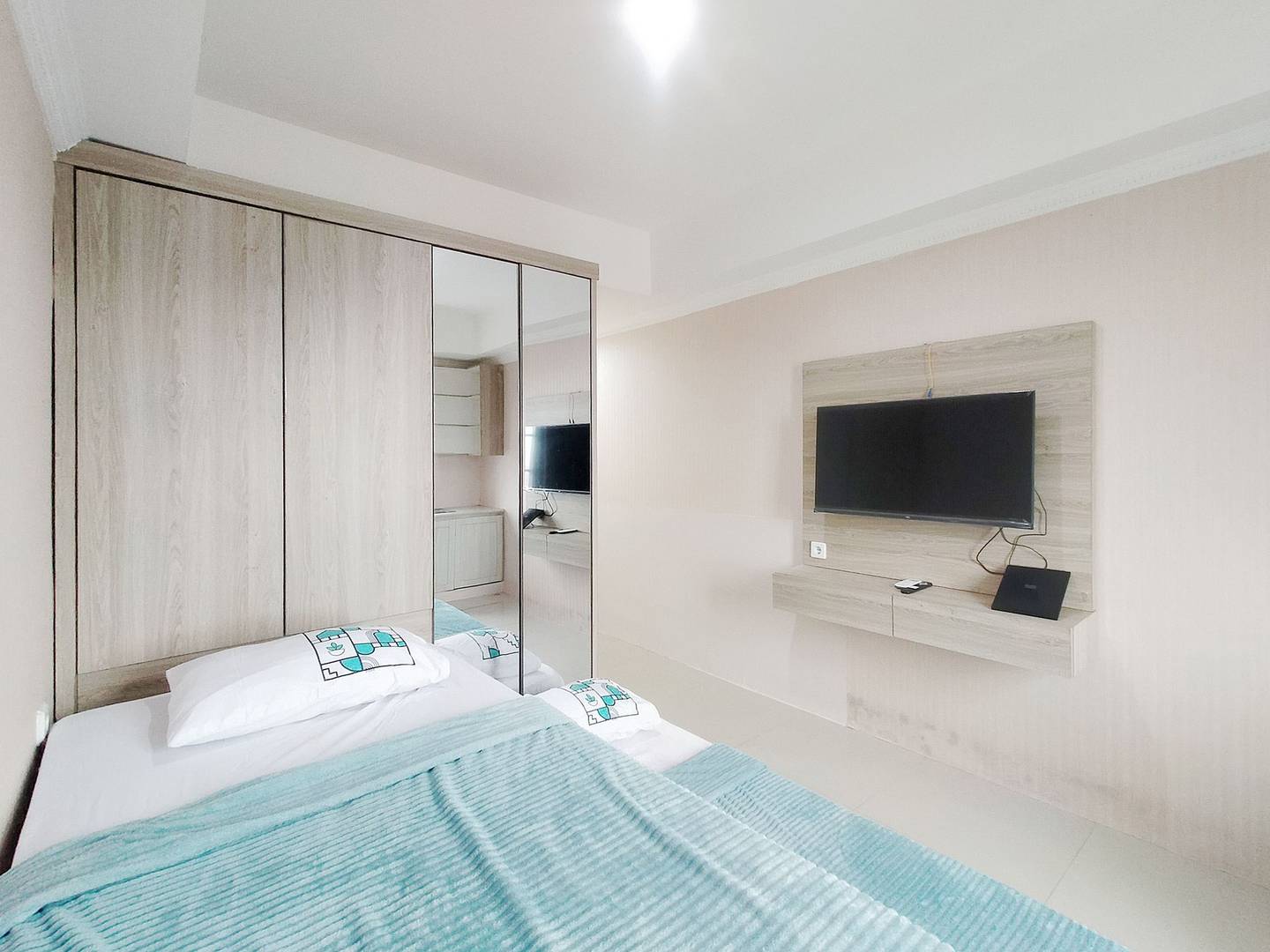 https://images.rukita.co/buildings/building/10ee79f5-8ba.jpg