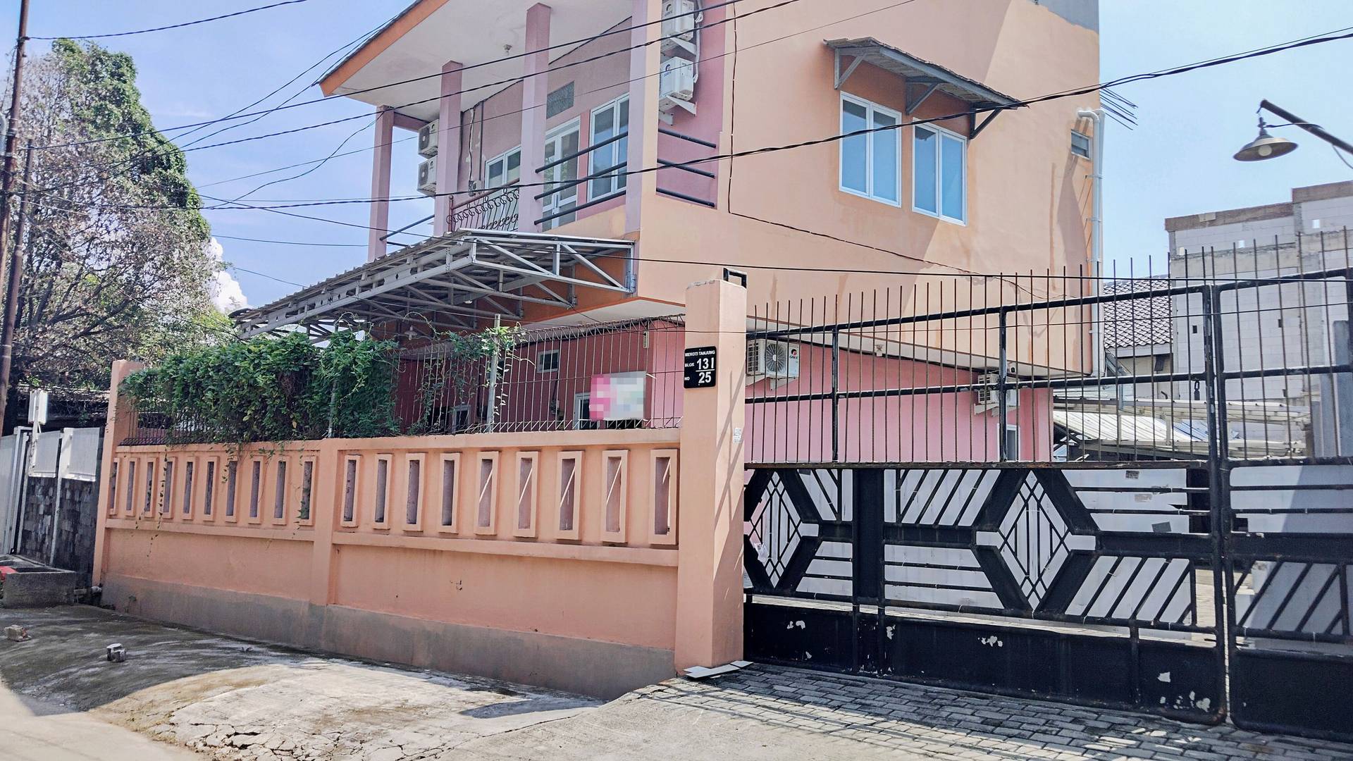 https://images.rukita.co/buildings/building/6ee38fa9-a03.jpg