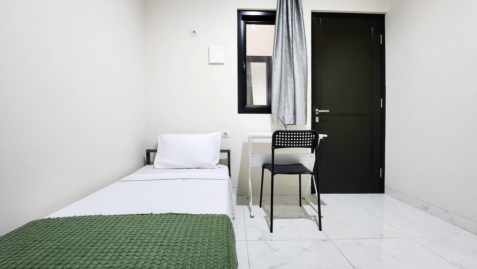 https://images.rukita.co/buildings/building/7e60dd55-bf33-4cfa-a52e-ca5f81d644f5.jpg