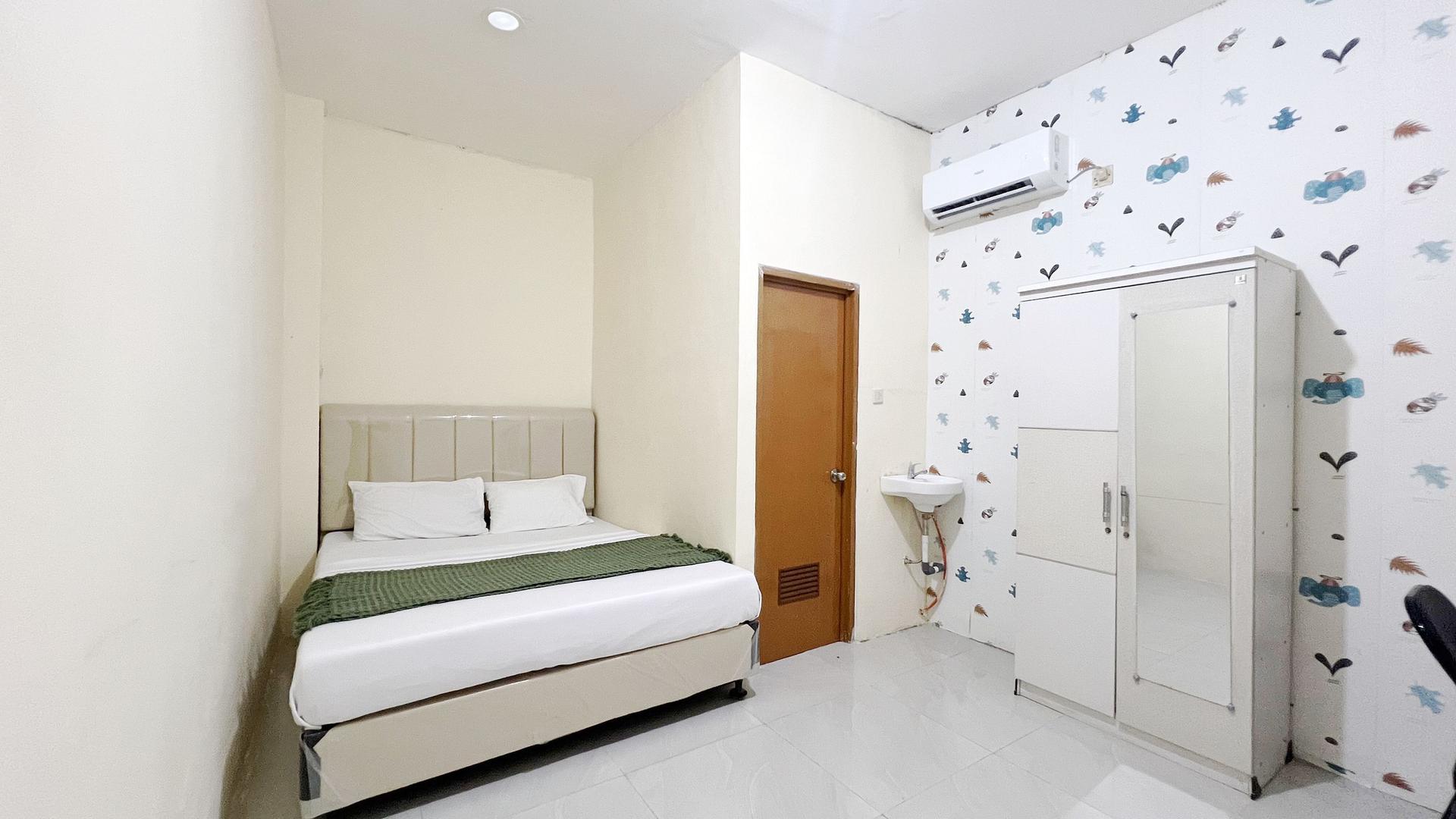 https://images.rukita.co/buildings/building/80ec44e6-df0.jpg