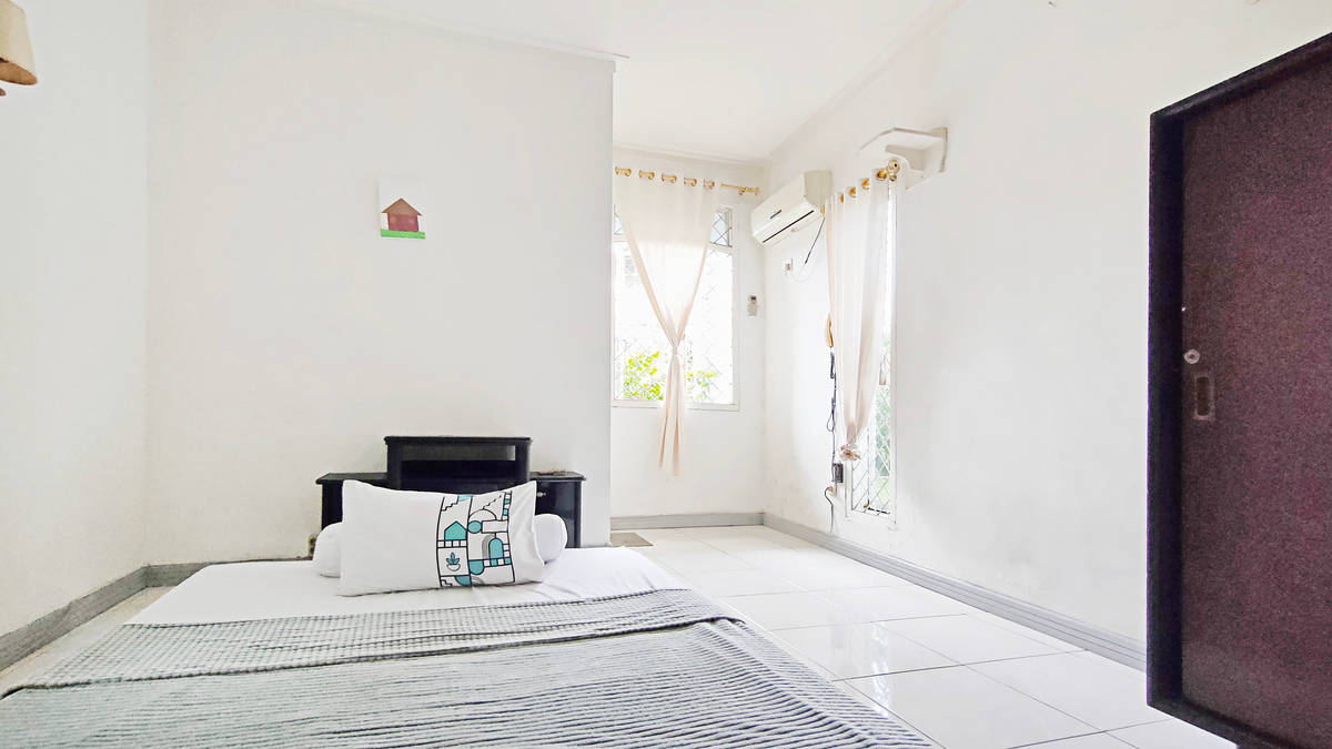 https://images.rukita.co/buildings/building/87f097fb-060.jpg