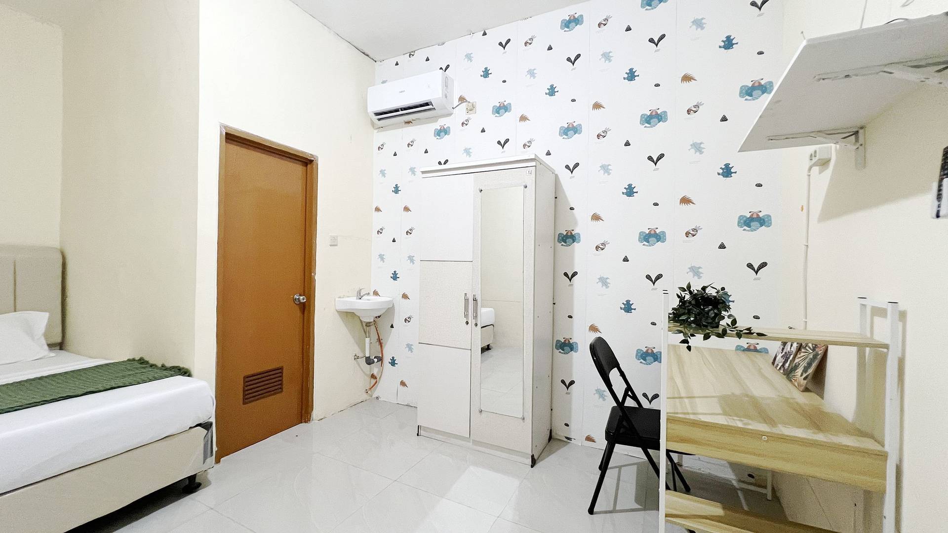 https://images.rukita.co/buildings/building/9b5211da-ab5.jpg
