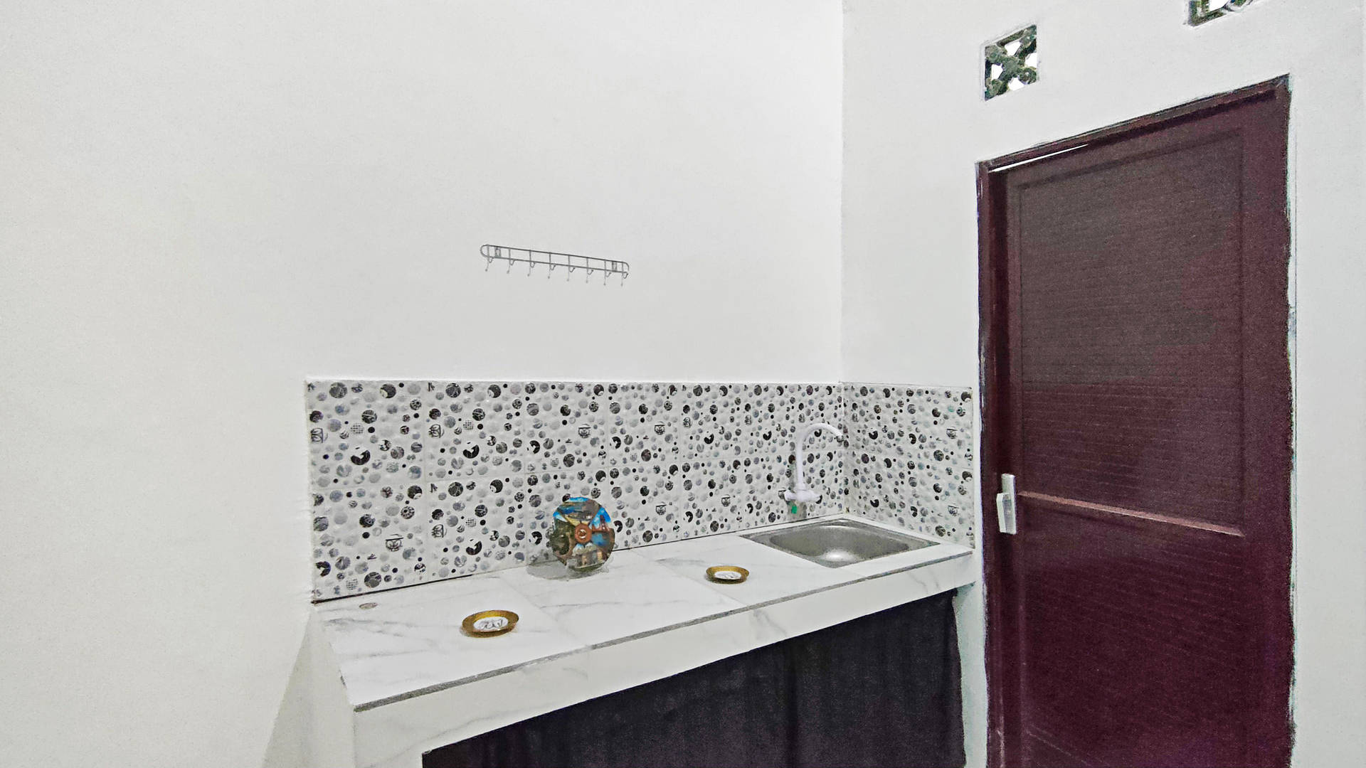 https://images.rukita.co/buildings/building/9f13fc9e-659.jpg