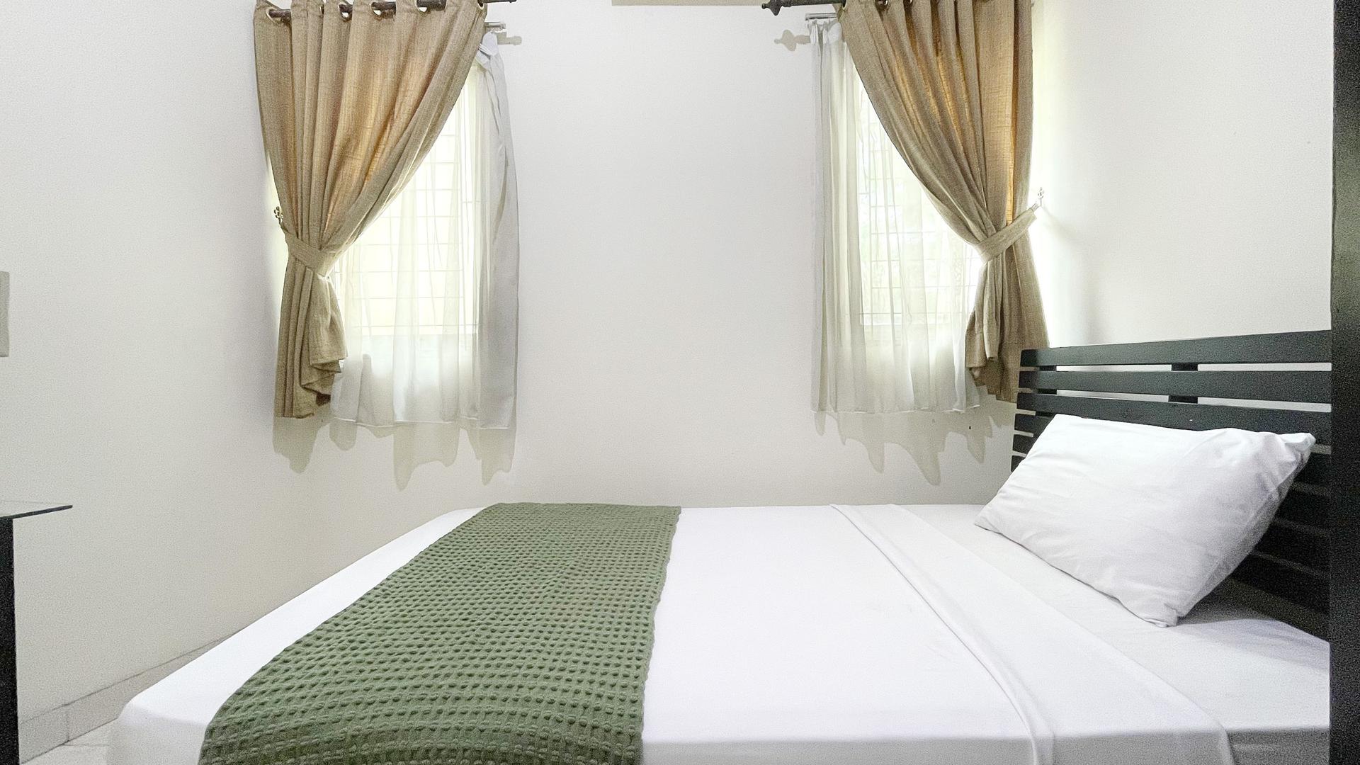 https://images.rukita.co/buildings/building/c93891df-db35-4ce2-ad5a-5cba579de70f.jpg