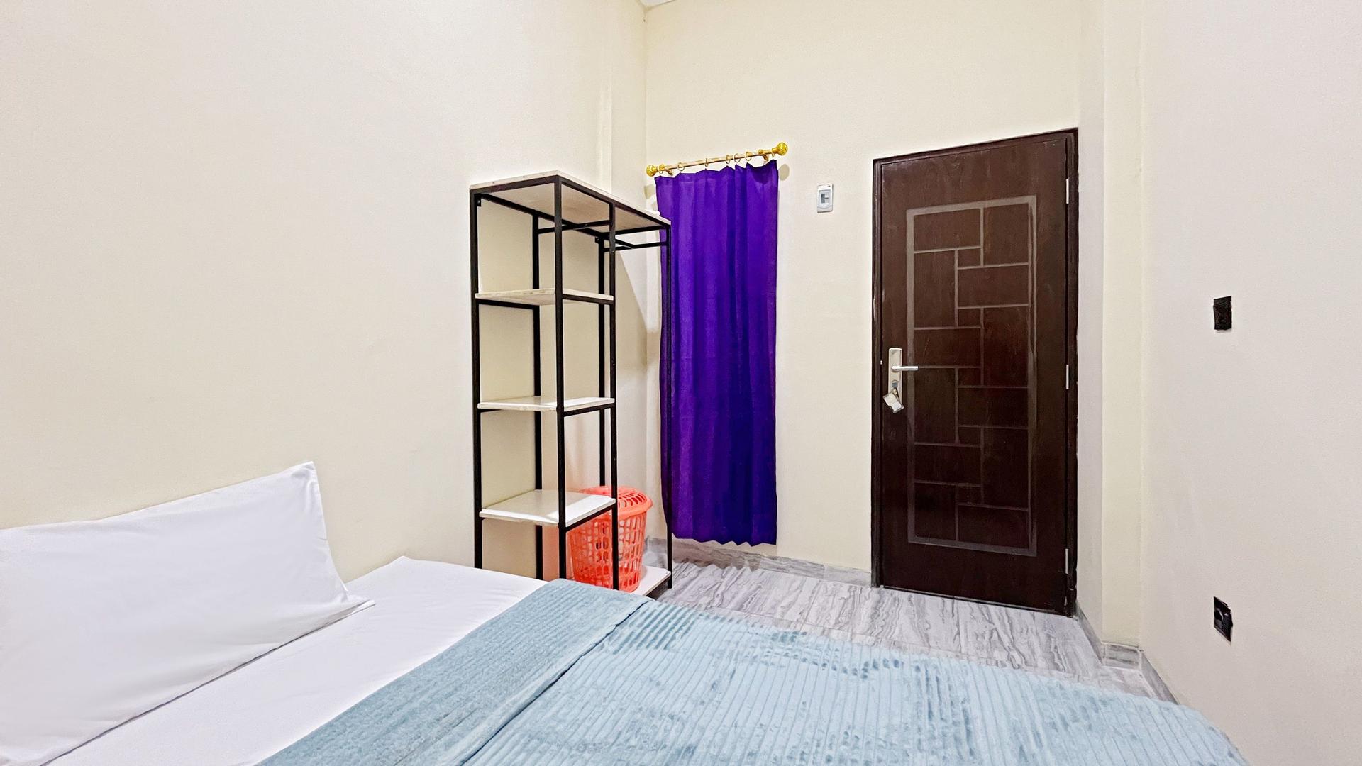 https://images.rukita.co/buildings/building/e398fe87-4b2.jpg