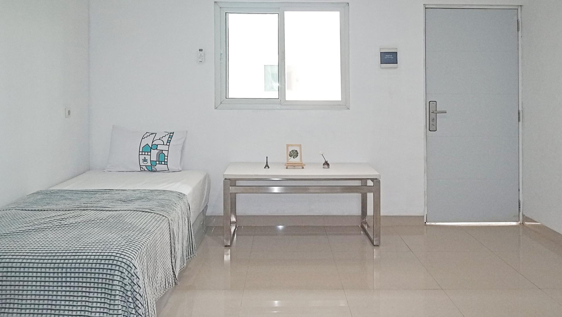 https://images.rukita.co/buildings/building/e4fa8d2c-3af.jpg