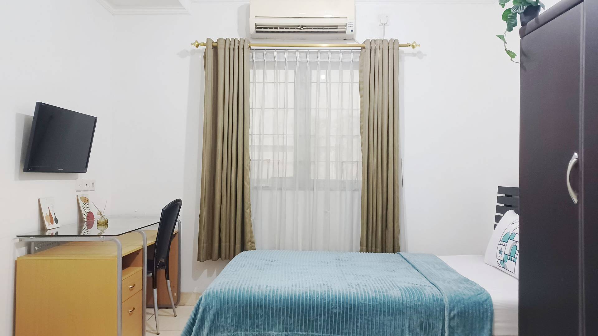https://images.rukita.co/buildings/building/f133183f-b9a.jpg